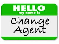 Green sticker with Hello my name is Change Agent written on it