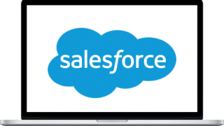 A laptop with the Salesforce logo on the screen