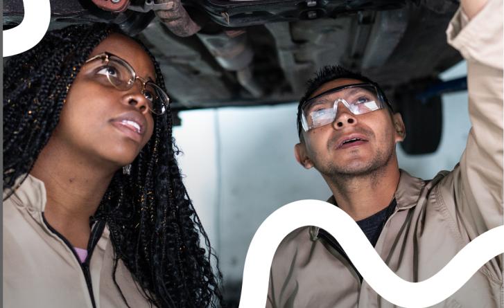 People looking under car